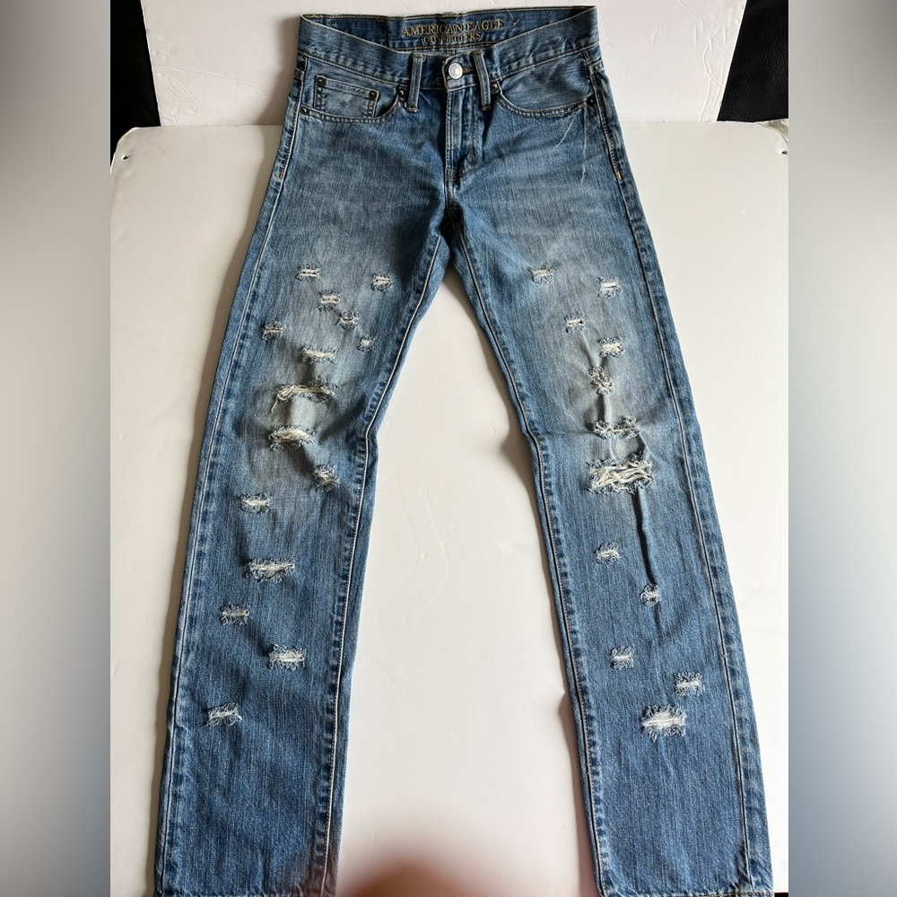 almost new ripped taper light tone jeans
